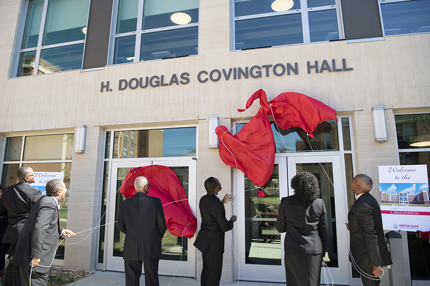 H. Douglas Covington Hall sign is unveiled on side of building