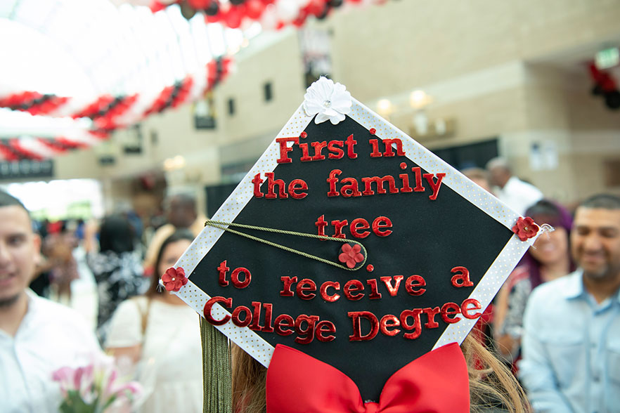 graduation cap that says "first in family tree to earn a degree"