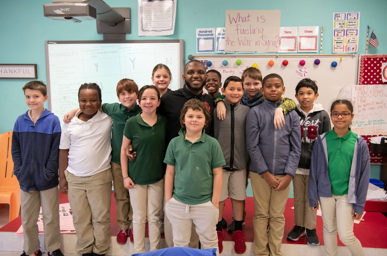 Devin Rankin with students from his class