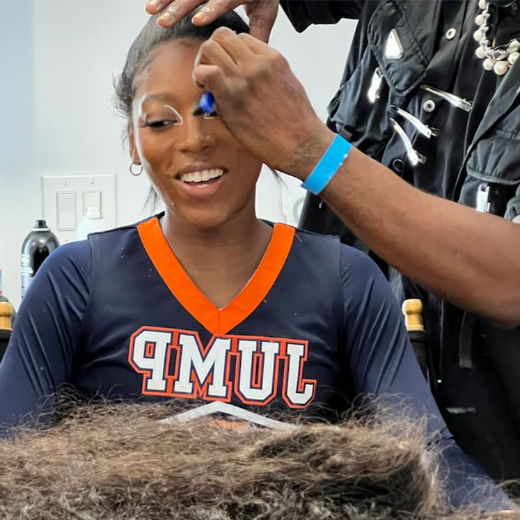 WSSU Cheer getting hair styled