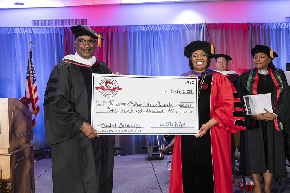 People receiving a check