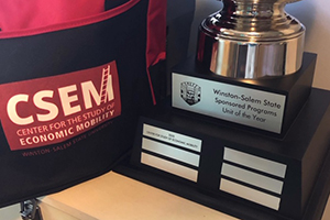 A Trophy and a CSEM Swag Bag