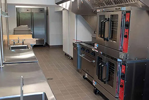 Stove, ovens, and sinks in the Enterprise Center Kitchen