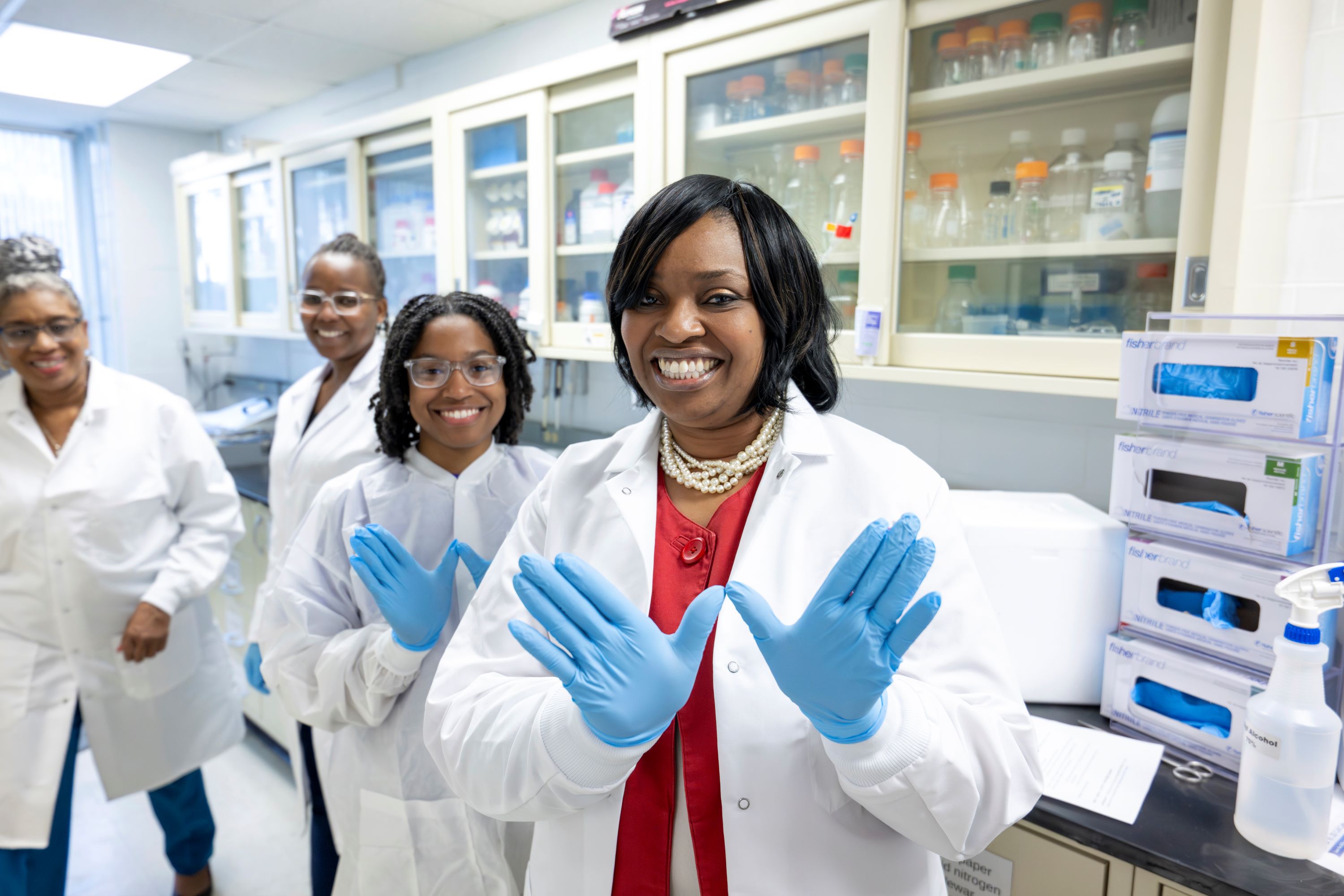 Chancellor brown in BRIC lab with students