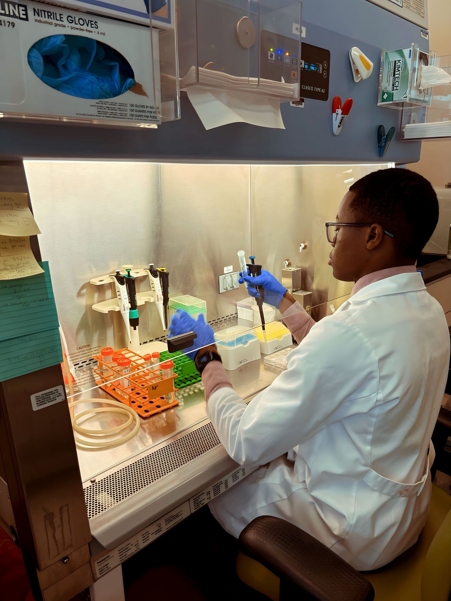 student in culture hood