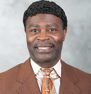 Dr. Cecil Holland