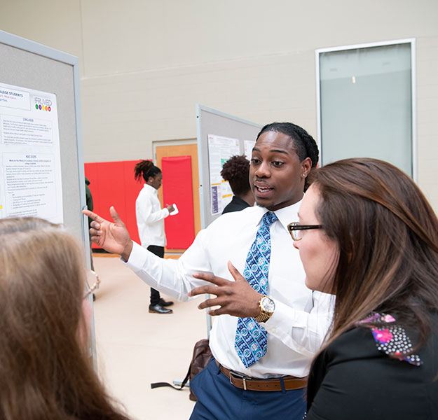 student researcher talking